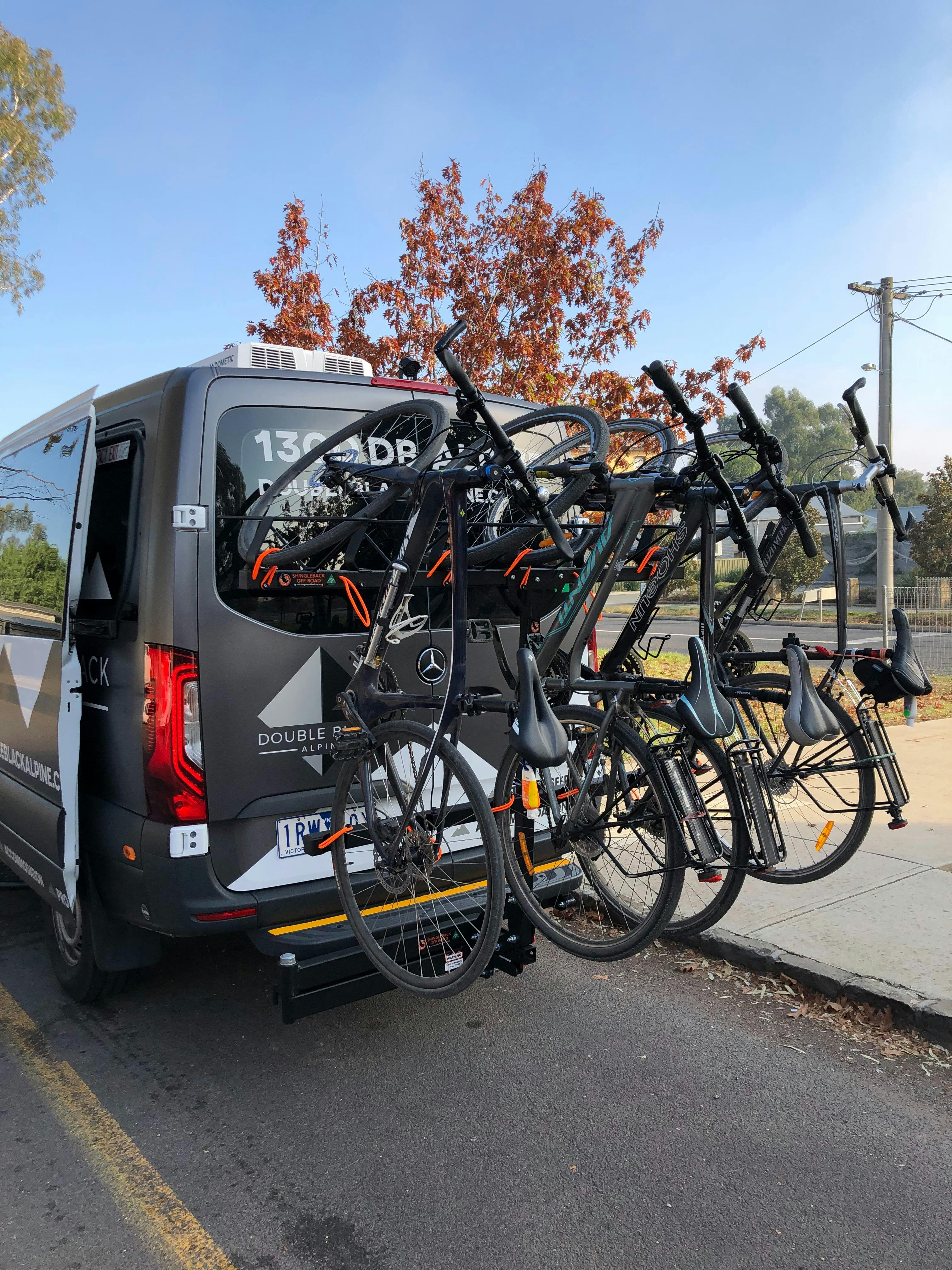 Double Black Alpine passenger van is loaded with bikes for guest and bike shuttle along the GVRT.