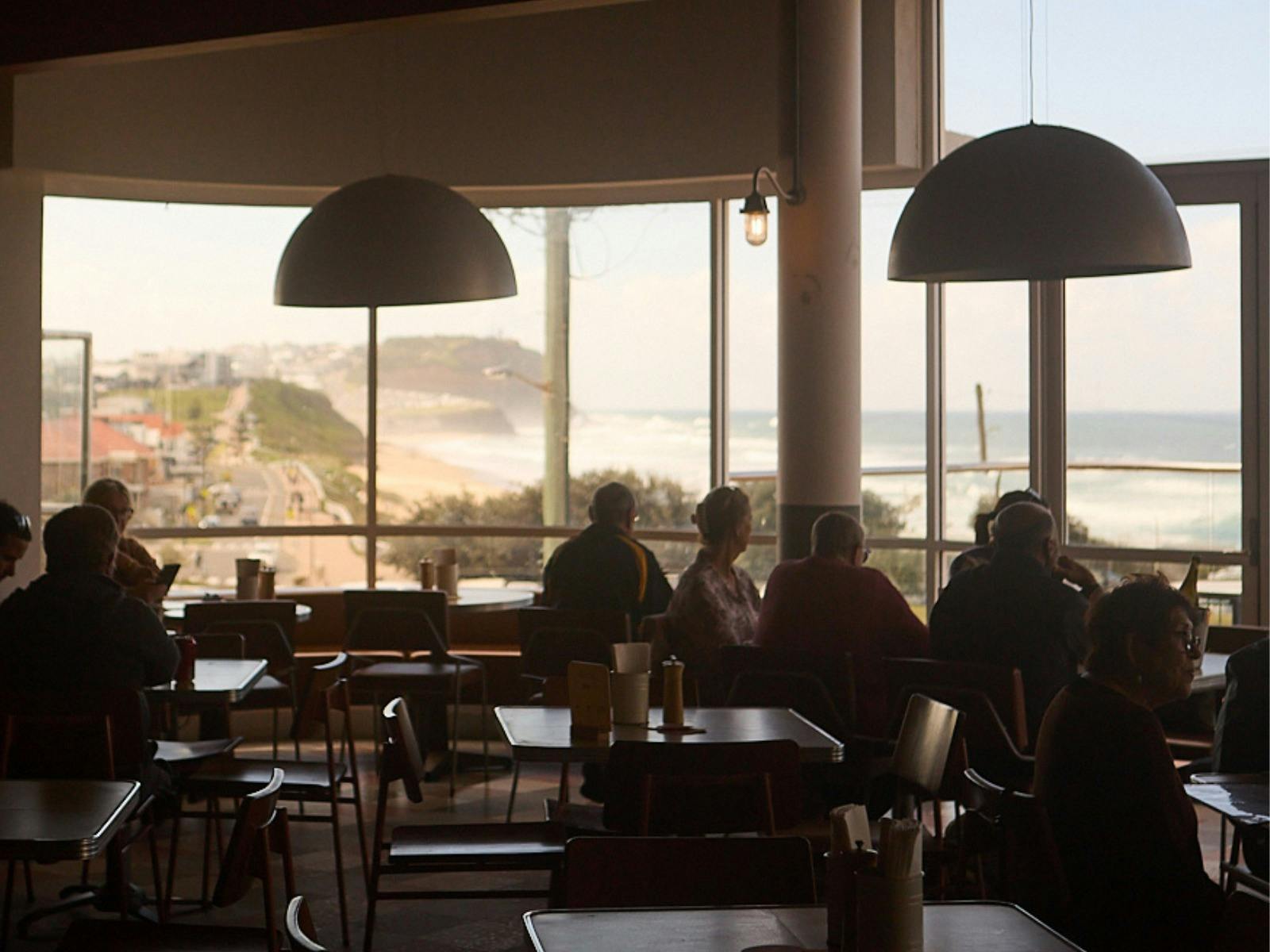 The dining room at The Beach Hotel highlighting the view of Merewether Beach