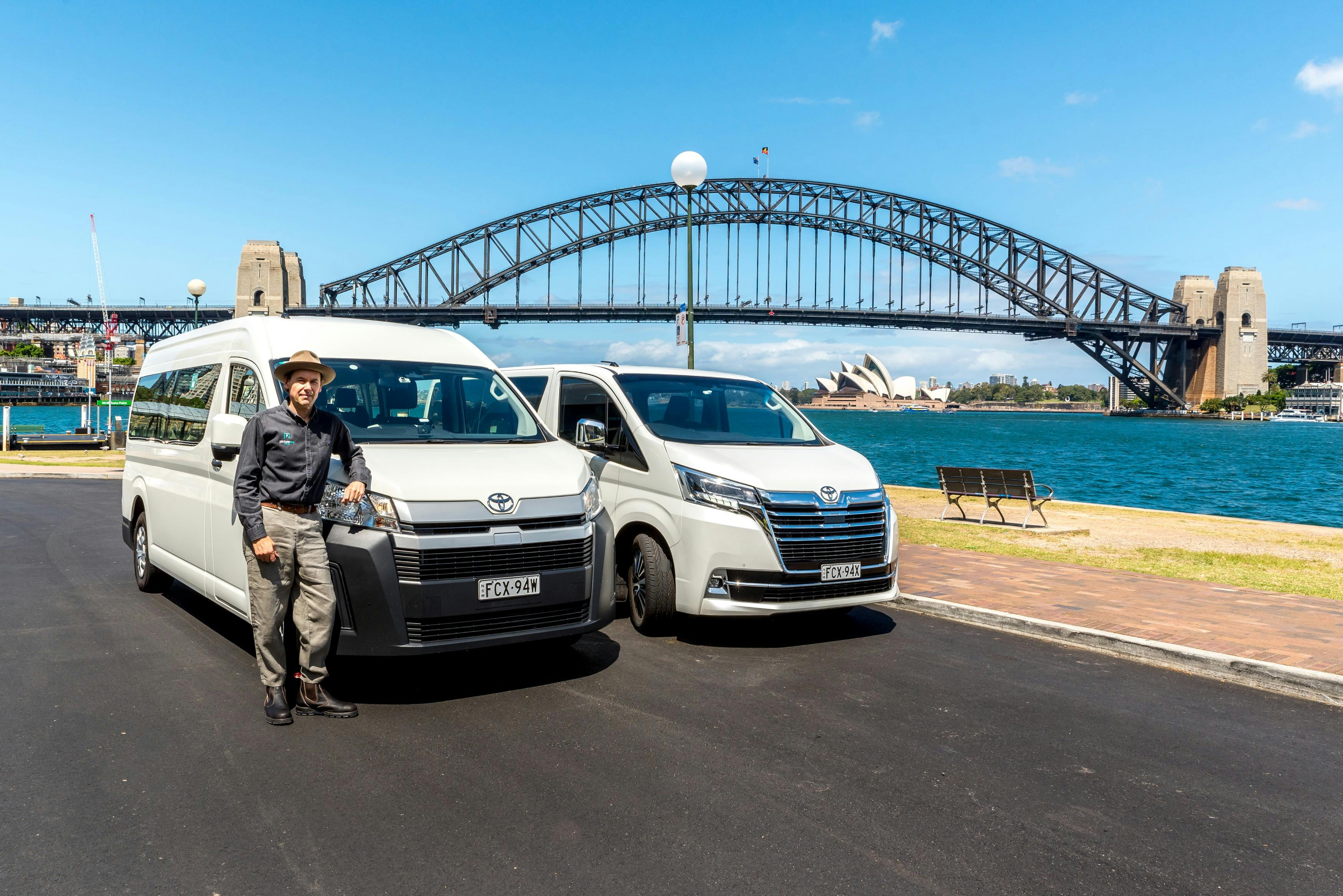 Two Picture Me Sydney vans in front of Sydney Harbour Bridge