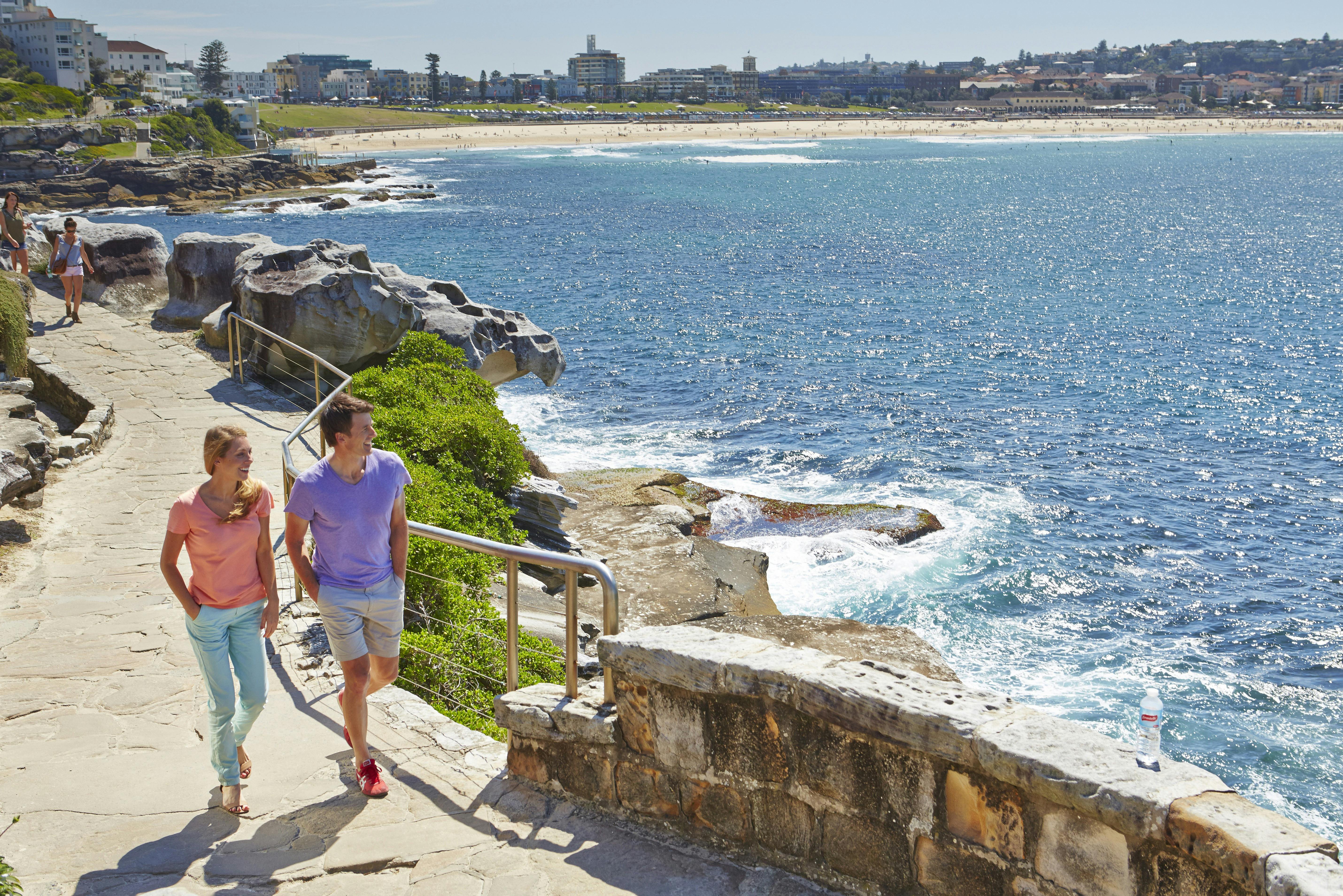 Couple enjoying the Bondi to Bronte coastal walk, Sydney.