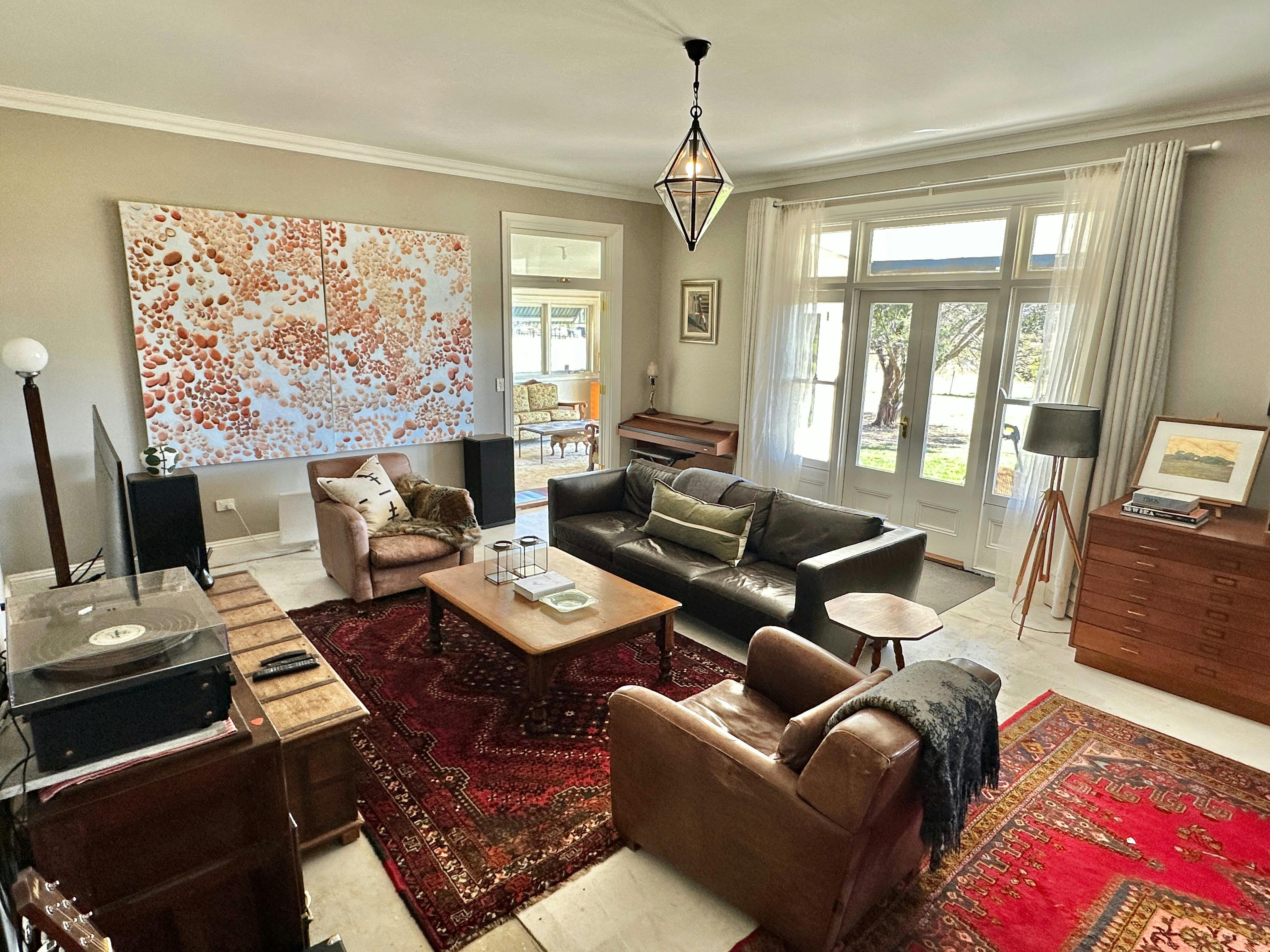 With 65" smart TV, record player, piano & guitar