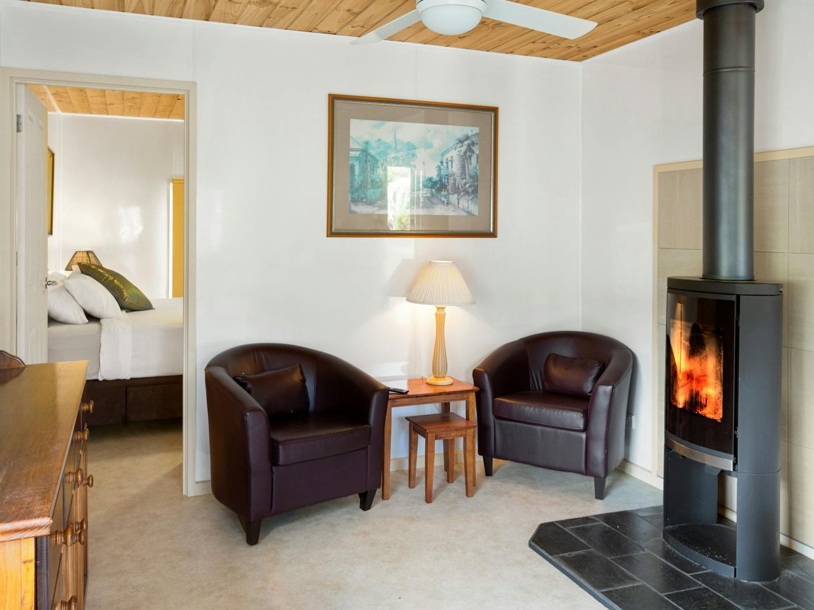 Cosy living room with woodfire at Daisy Hill Lodge 3