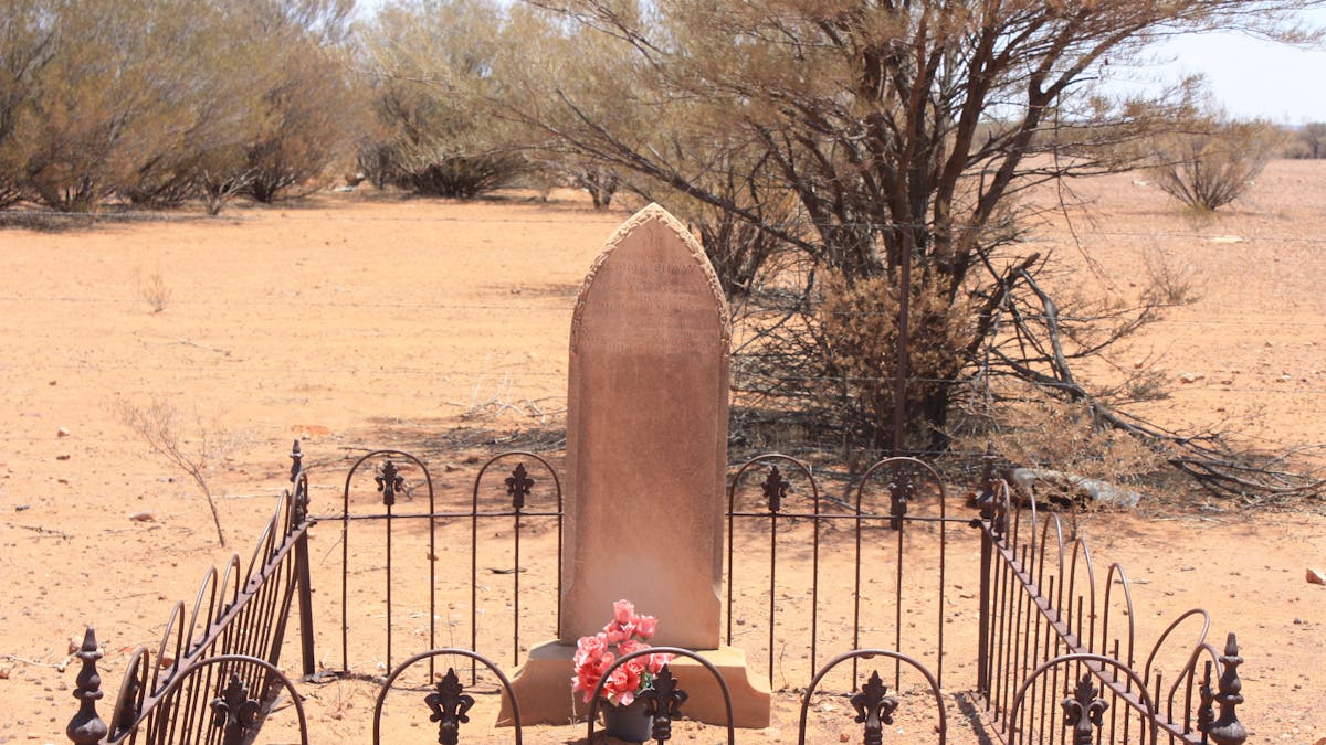 A lonely grave at the JC Hotel ruins