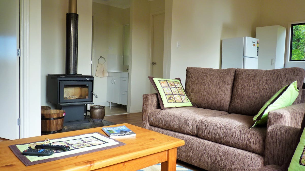 Accommodation hinterland nature farmstays Maleny Bellthorpe rainforest waterfall track fireplace