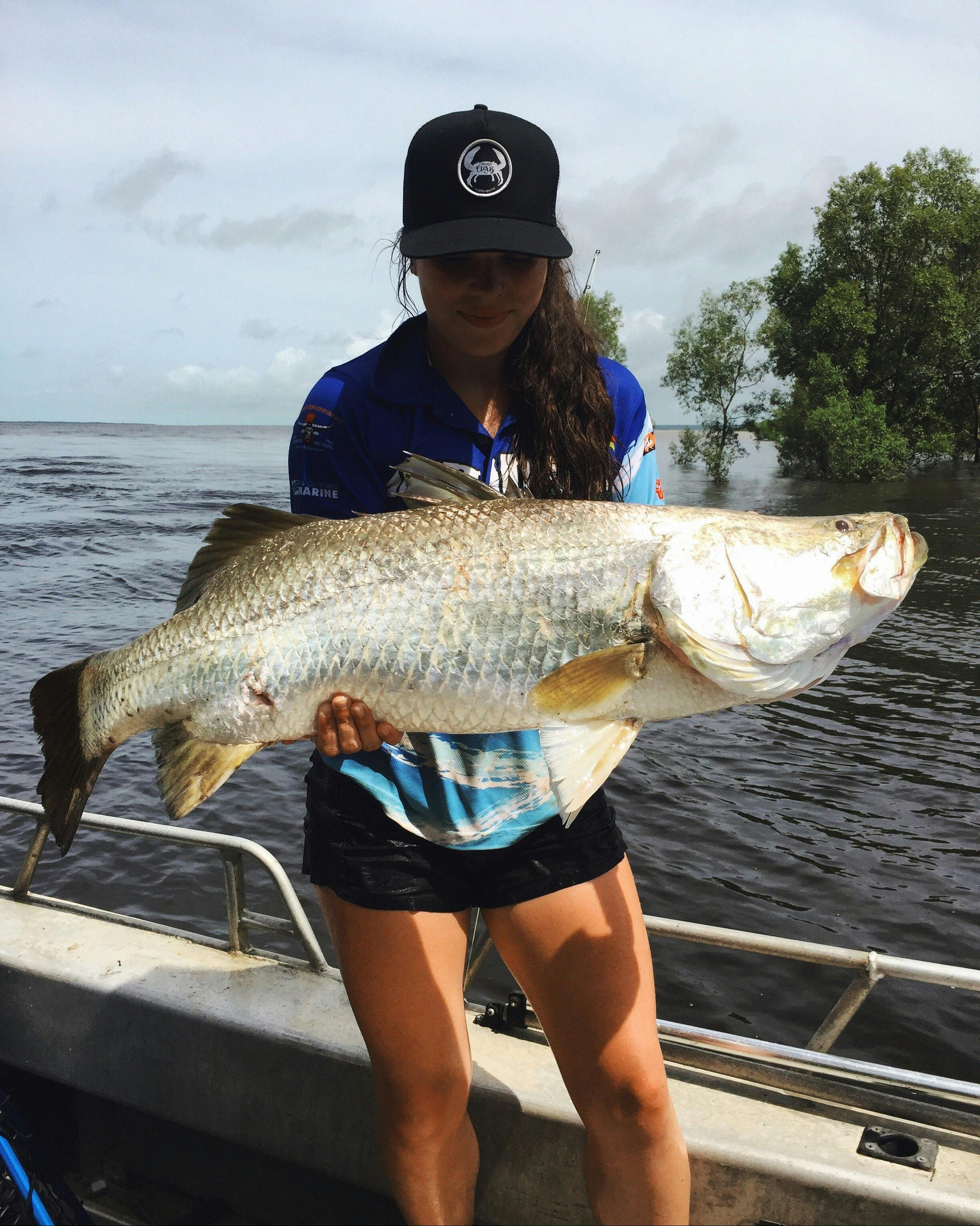 Humbug Fishing customer with a beautiful saltwater barramundi for the coastal creeks in Darwin