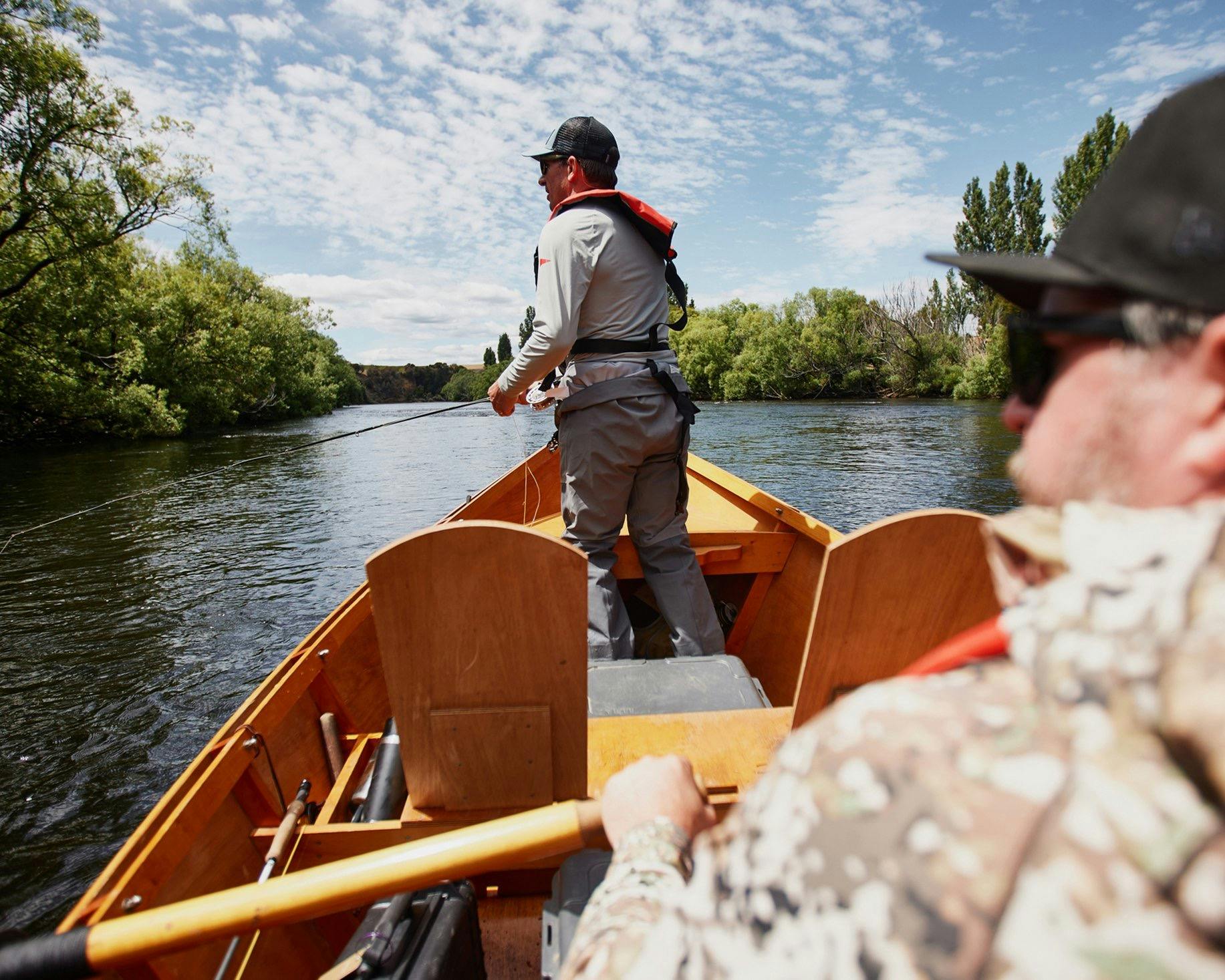 Guided fly fishing tour in a drift boat on a Tasmanian river