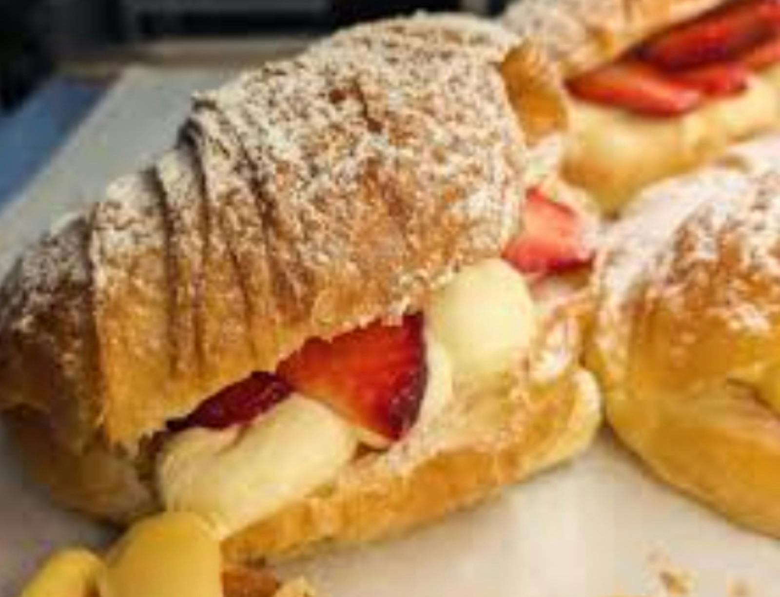 Croissant with strawberry and cream inside