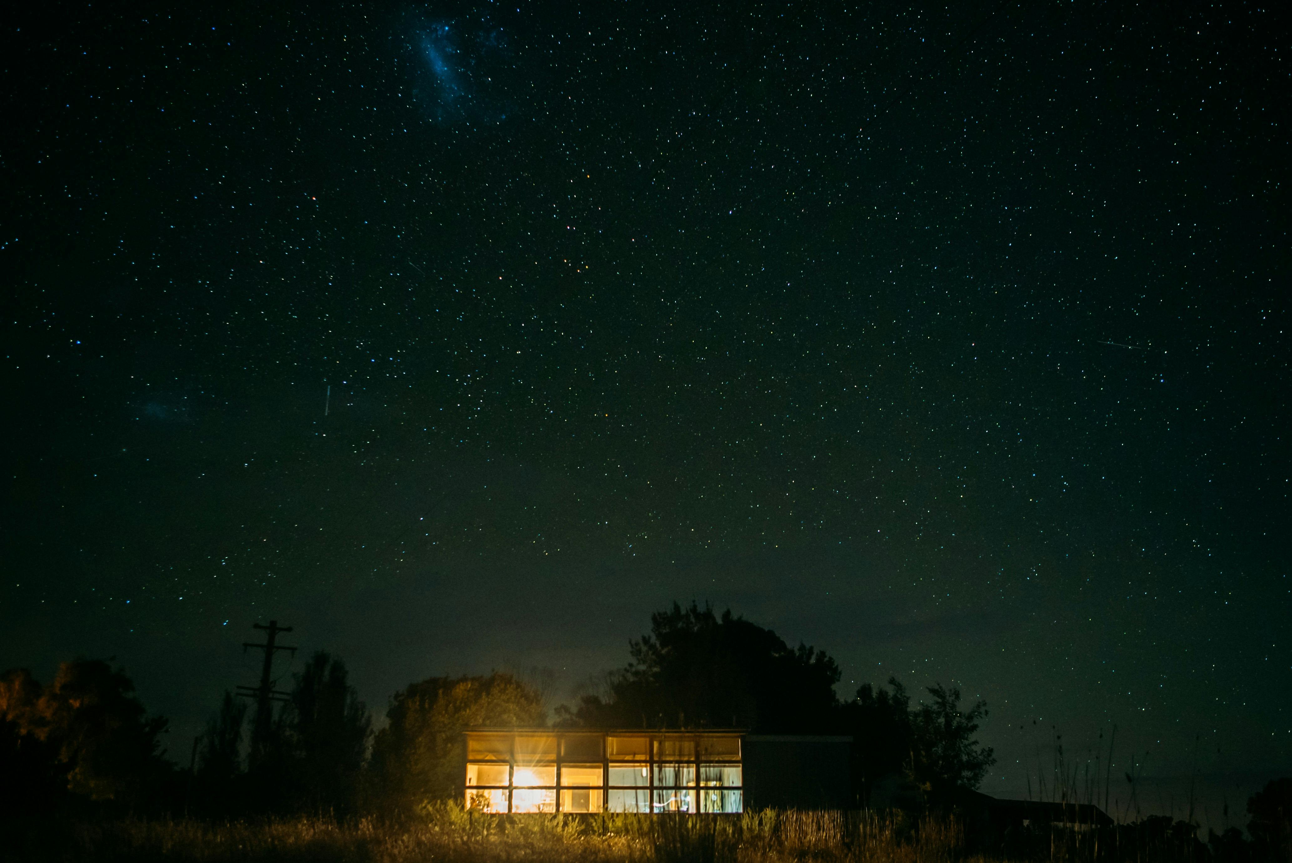 View of the Old School House with a big night sky