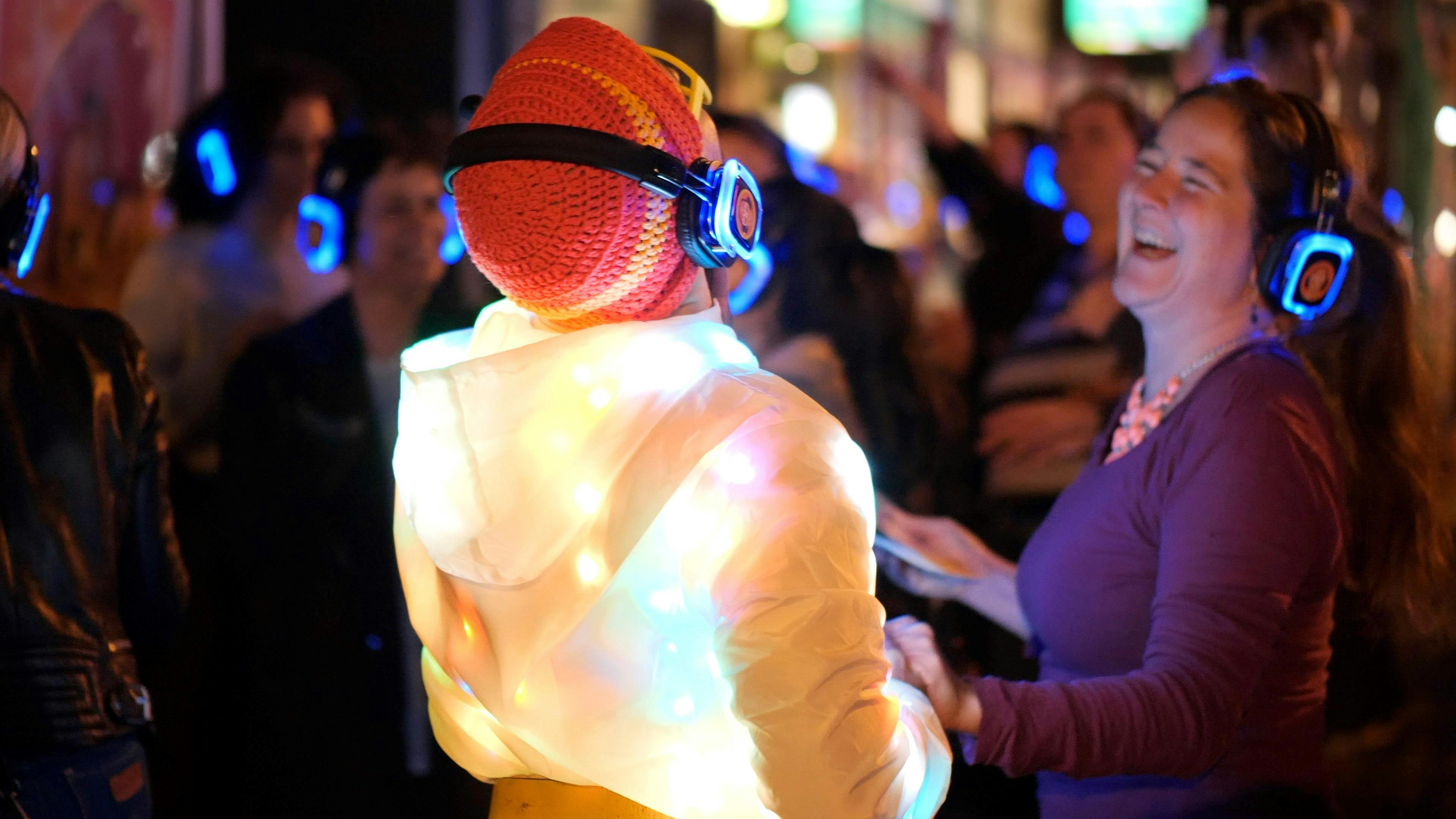 Guru Dudu Silent Disco Walking Tour, Two People Laughing