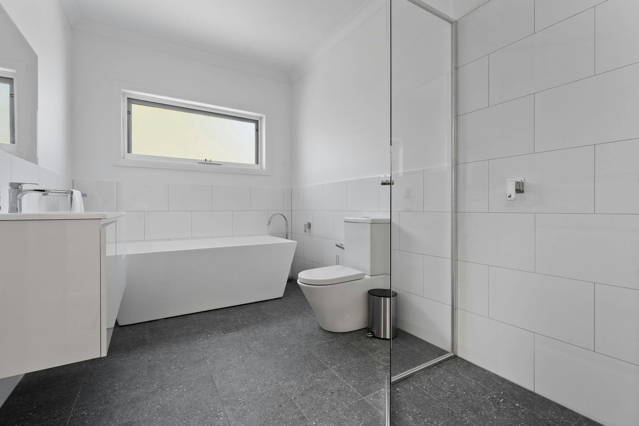 Bathroom with bath, toilet, shower and vanity