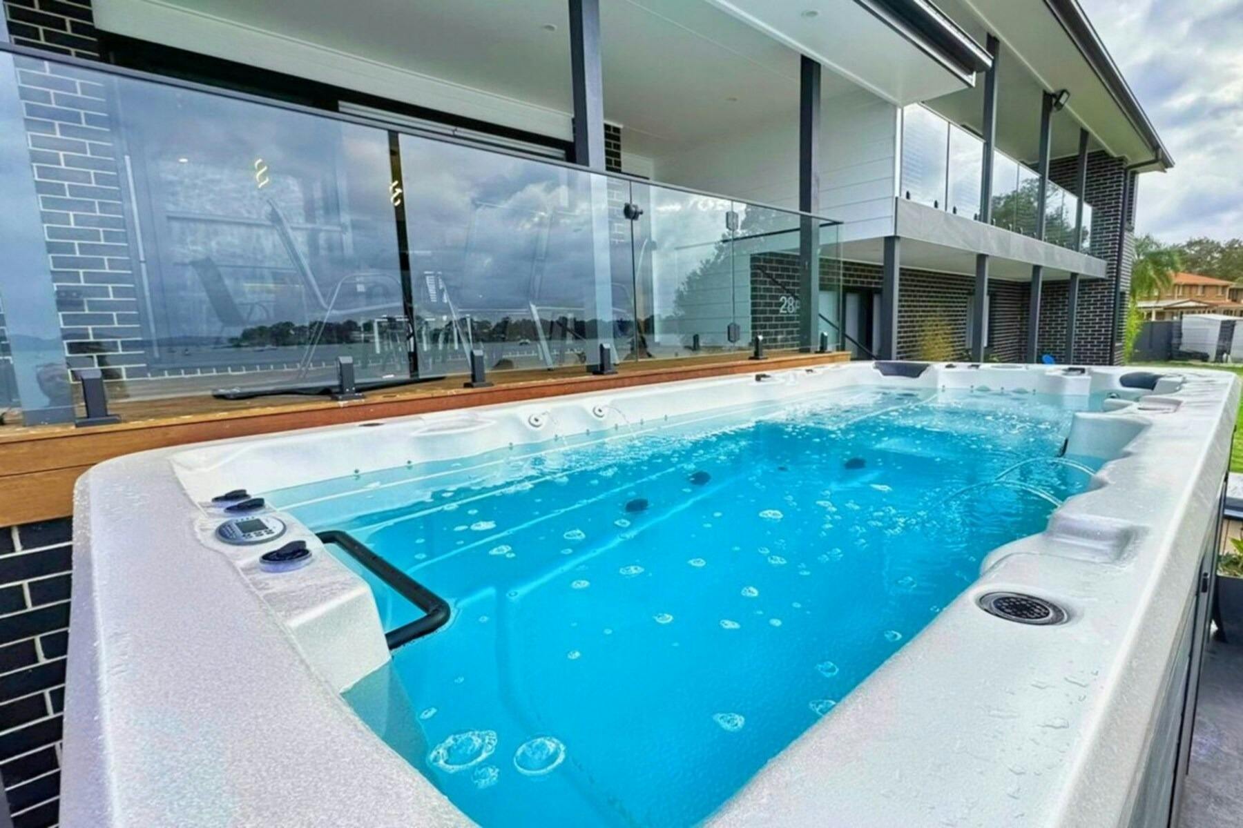 Heated swim spa with waterviews