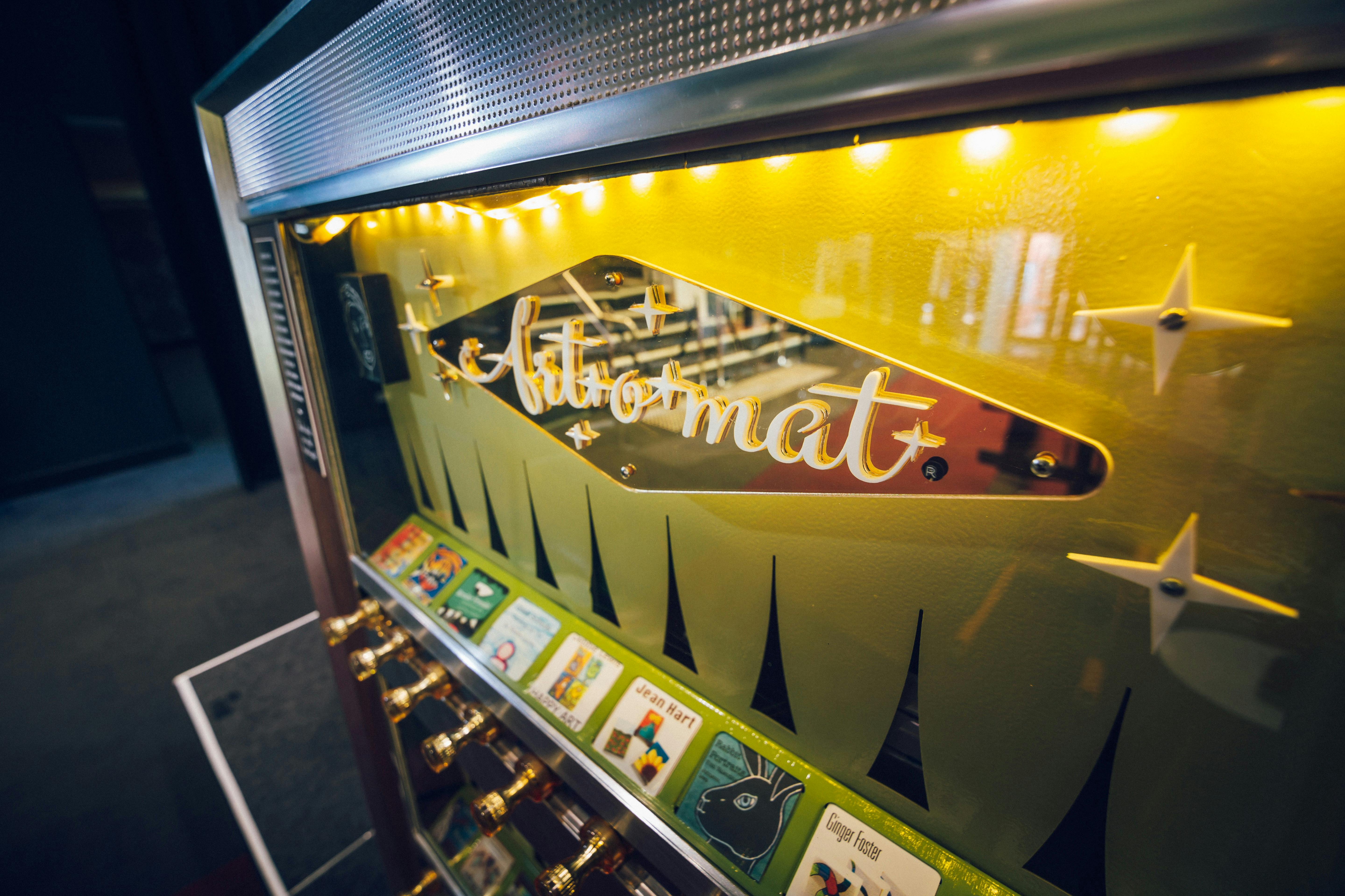 An art-o-mat machine (retired cigarette vending machine that have been converted to vend art.)