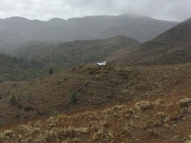 View of vehicle descending off Mt Caernarvon summit