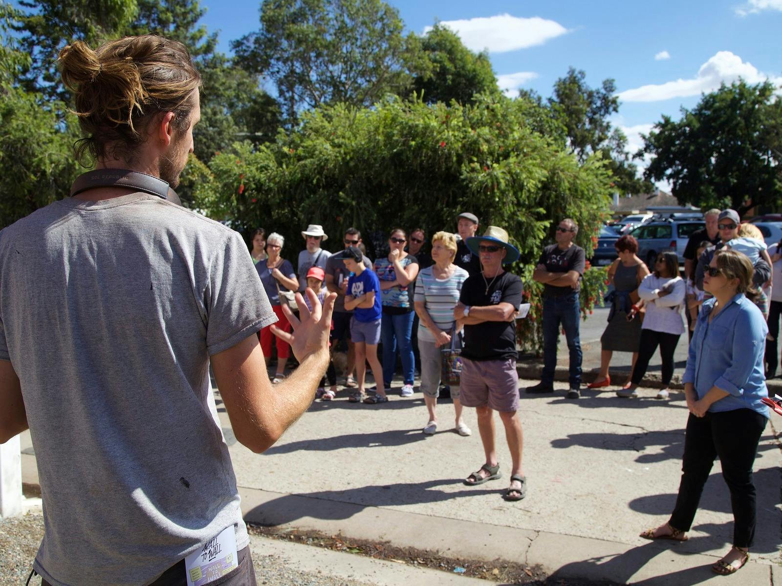 Adnate partipates in a street art tour
