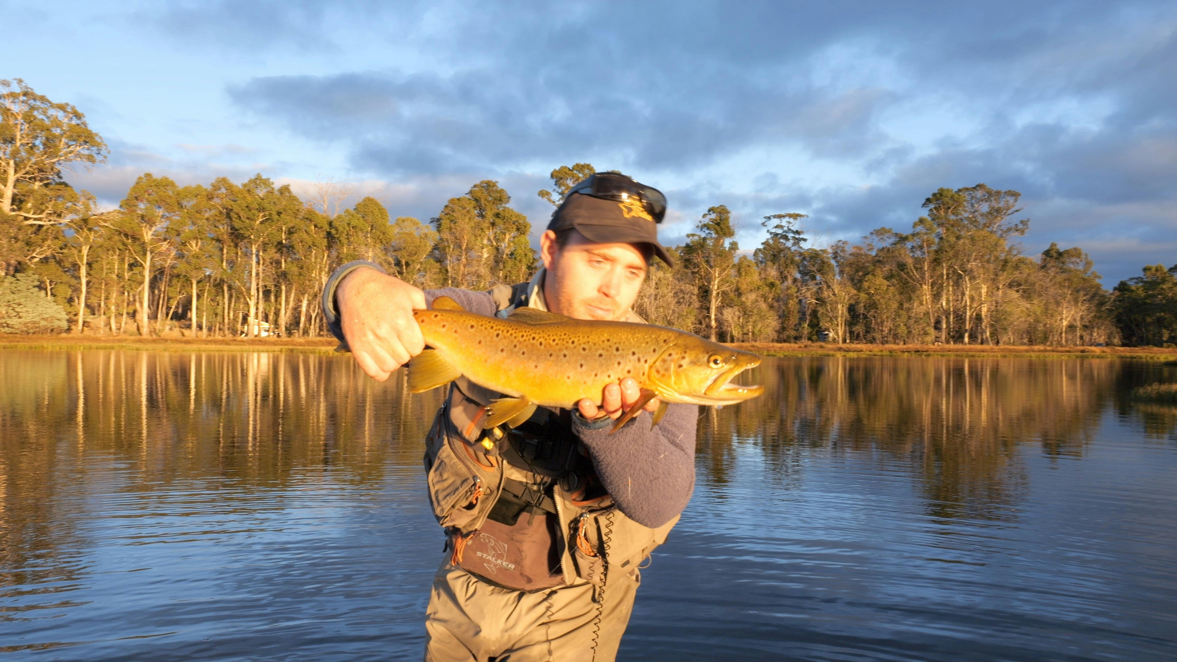 Matt holding large brown Tasmanian trout