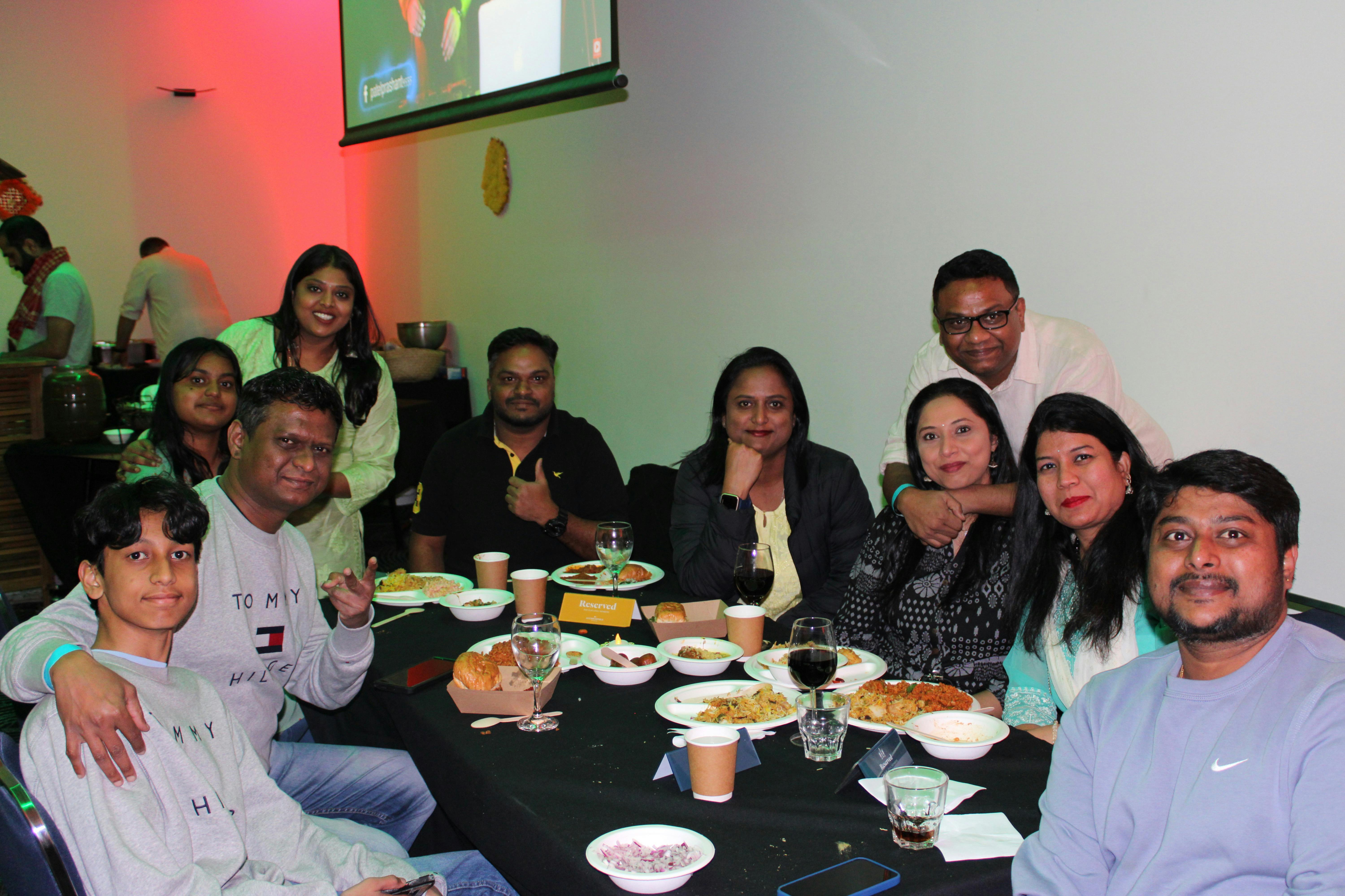 Guests enjoying food and each other's company
