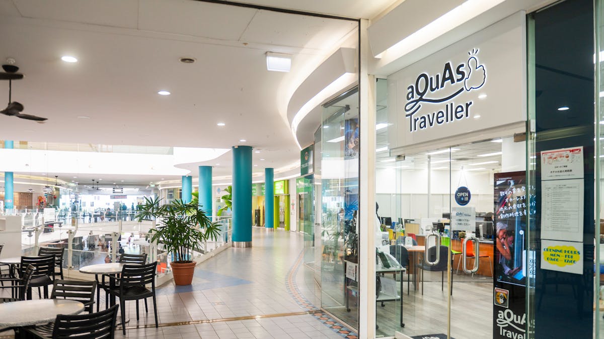 Upstairs photo showing some customer seating and aQuAs Traveller shop