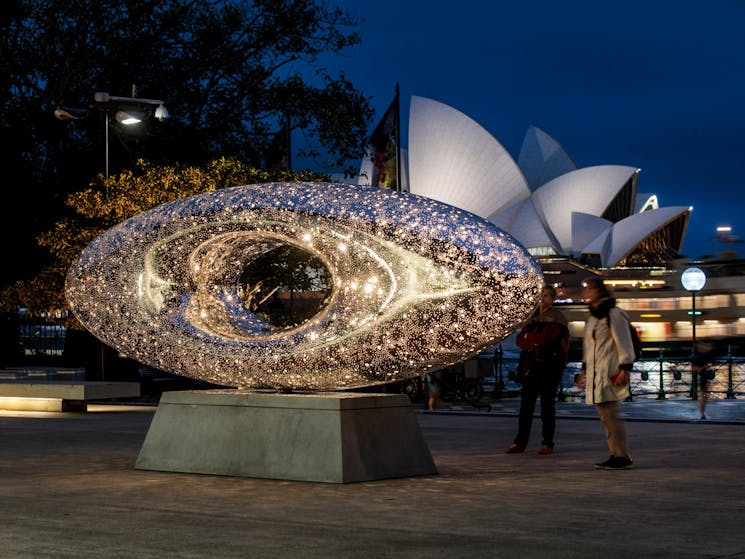 Lindy Lee's sculpture on the MCA forecourt with the Opera House in the background