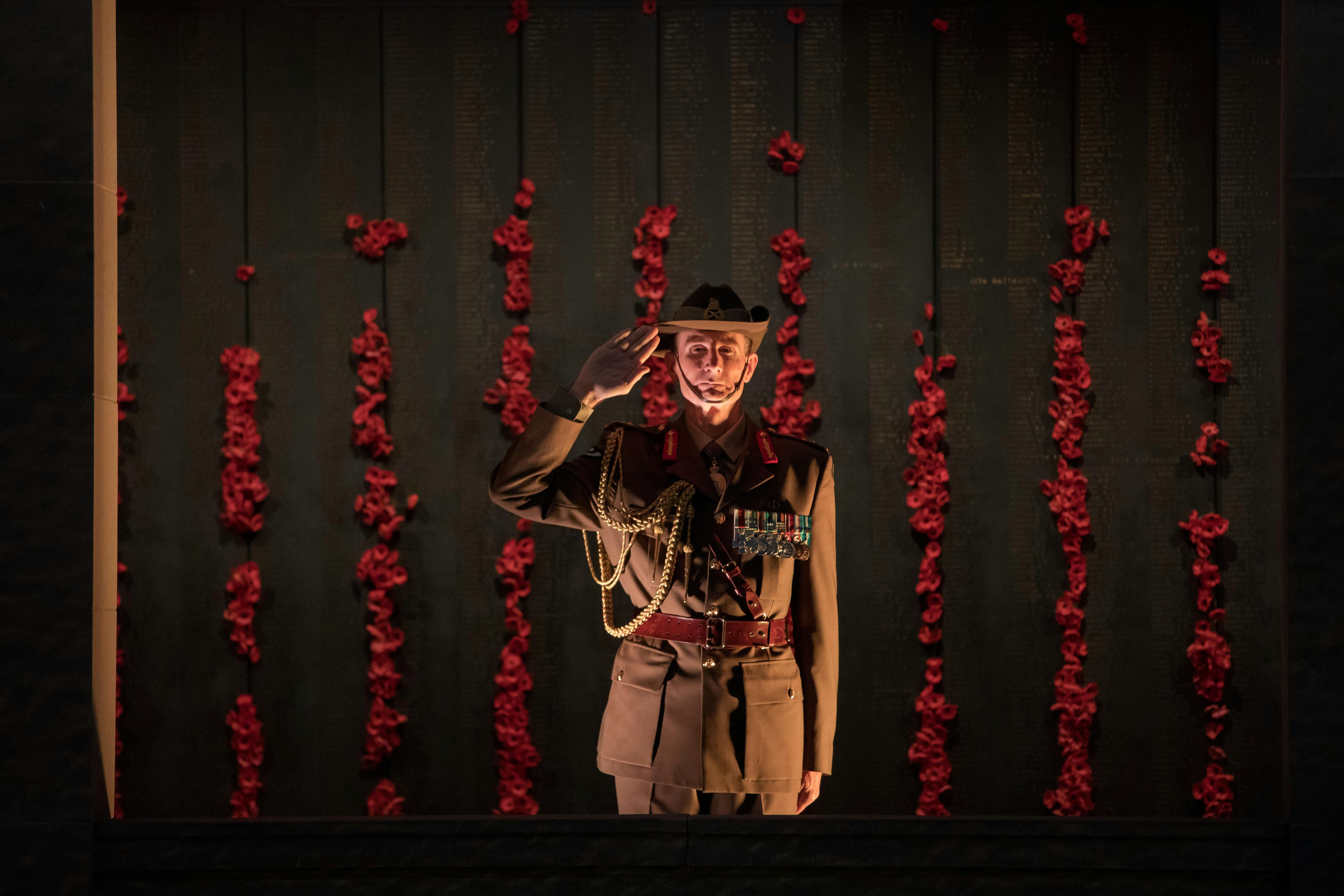 Defence person saluting at Anzac Day Dawn Service