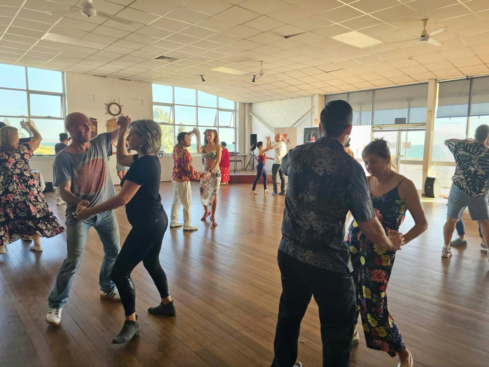 People dancing at our Salsa by the Sea Event
