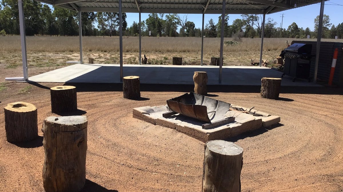 Shelter and fire pit