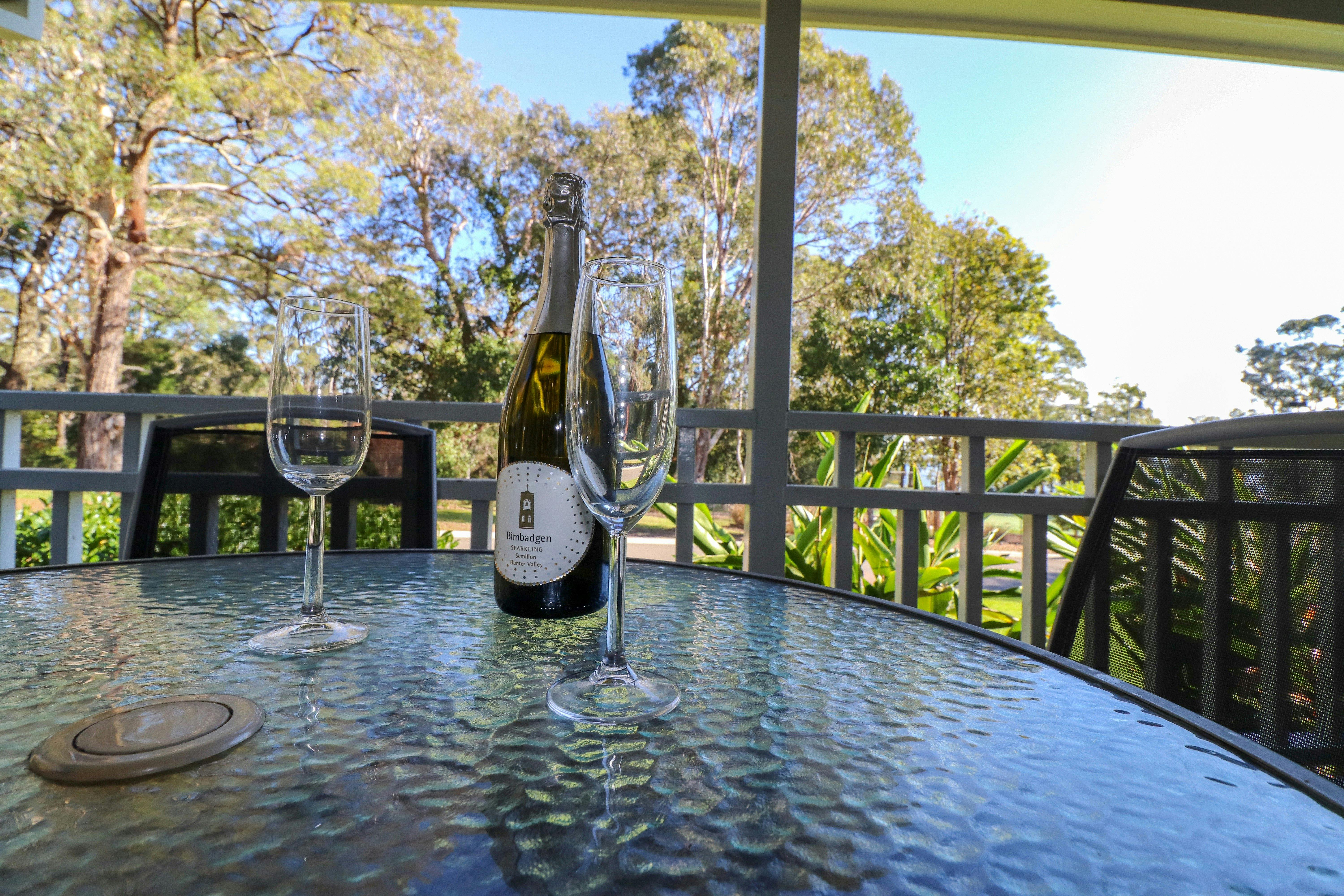 Enjoy a wine or cold beverage on the back veranda