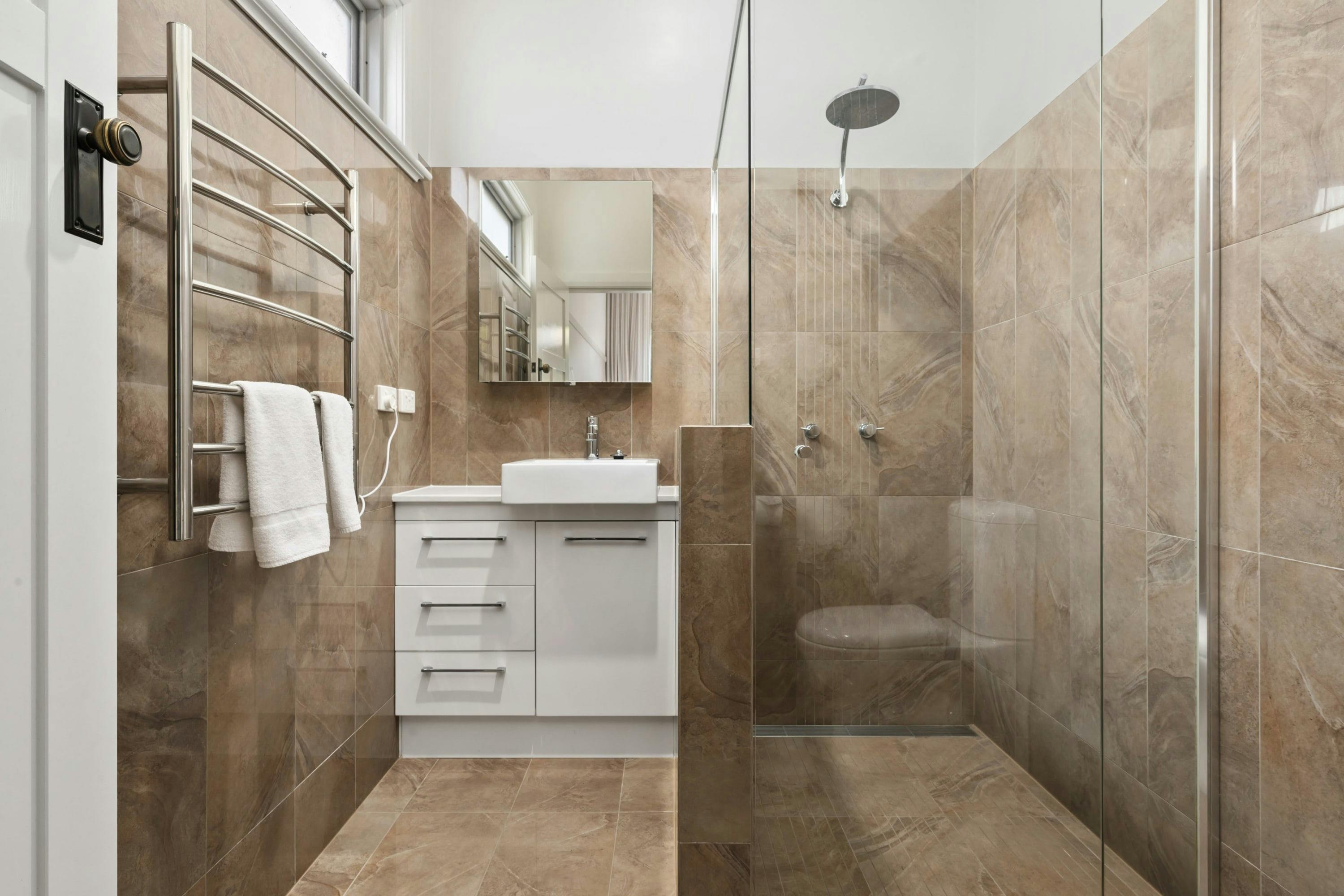Bathroom with shower, toilet and vanity
