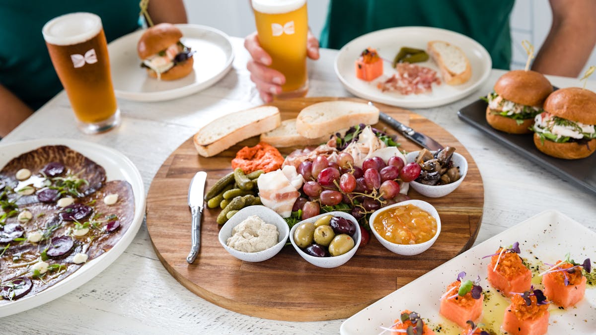 Selection of Dishes on table with beers