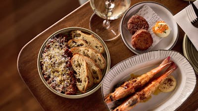 Beef Tartare + Gochujang + Sourdough Cracker, Yamba King Prawn + Aleppo Pepper, Flo's Potato Gems