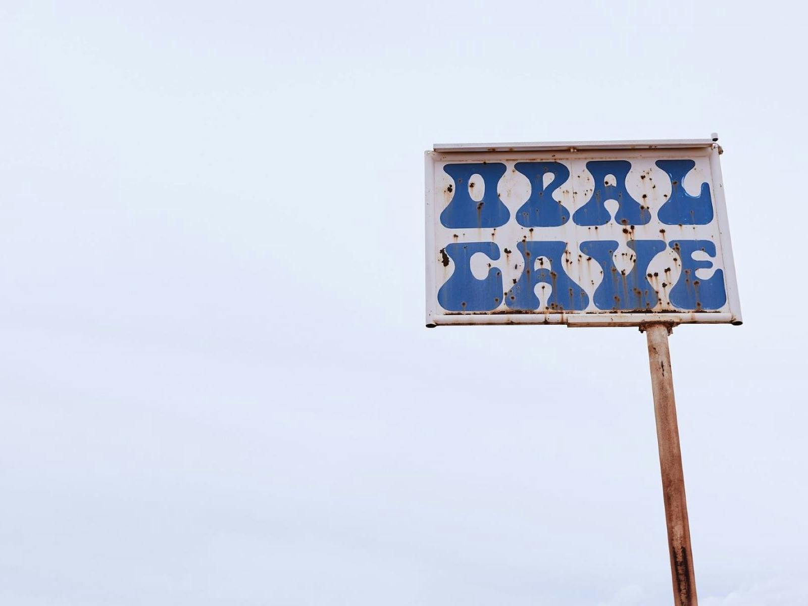 Opal Cave sign written in 'groovy' writing dating from the 1960's