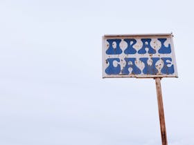 Opal Cave sign written in 'groovy' writing dating from the 1960's