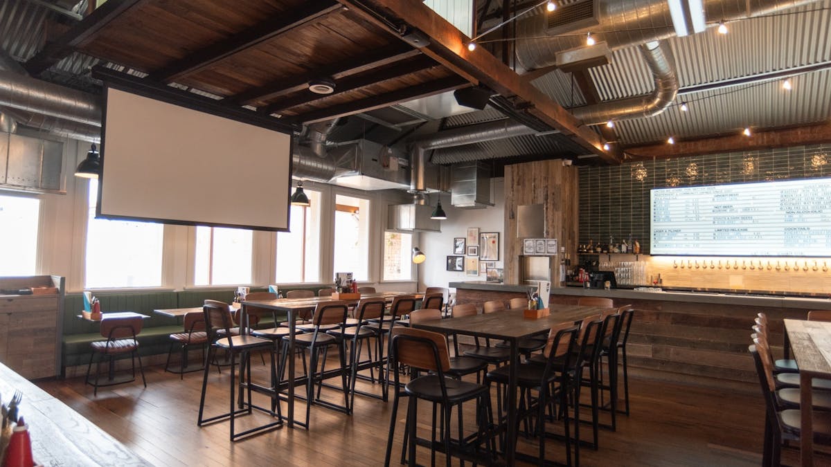 Brunswick St Level bar seating with projector