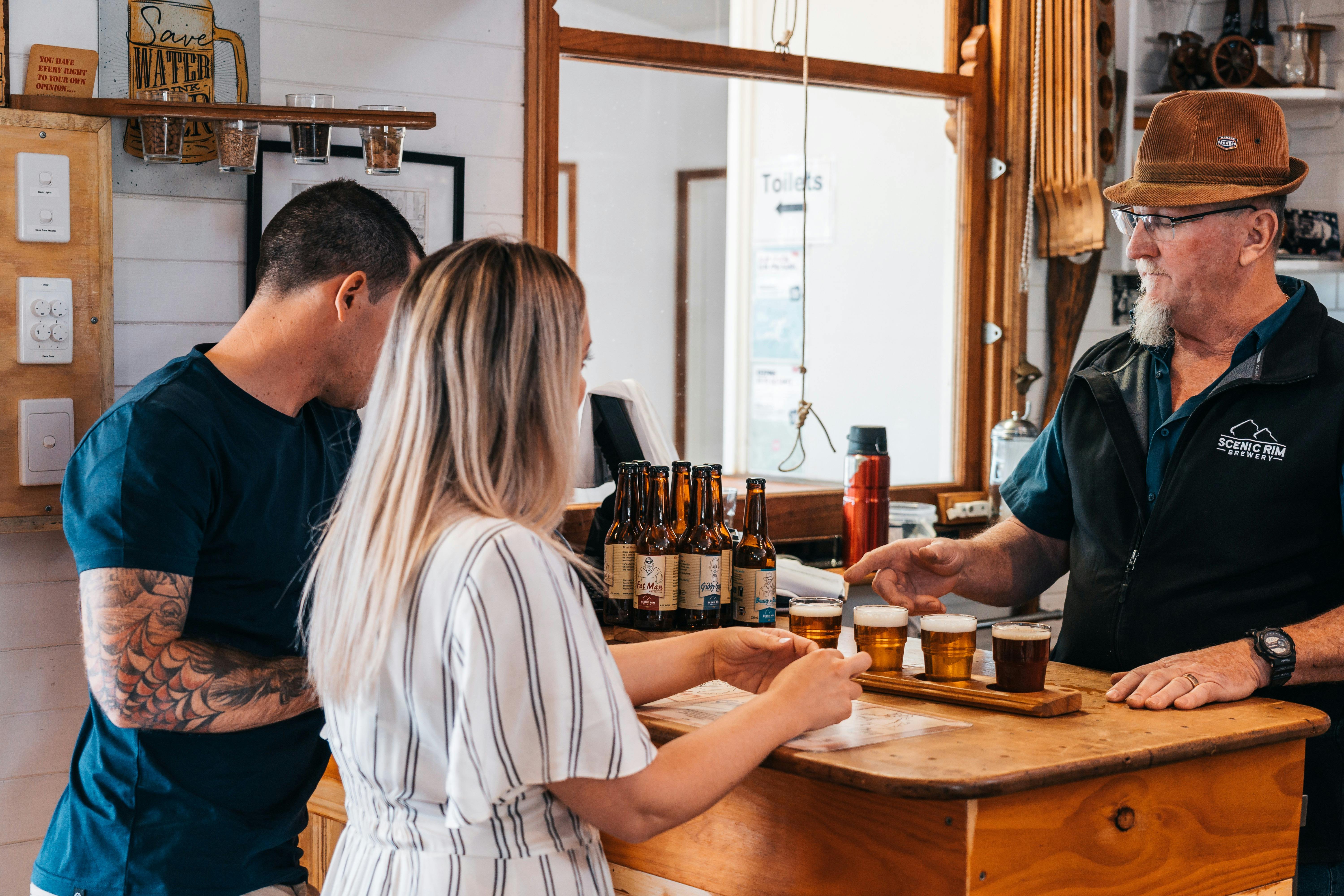 Young couple beer tasting at Scenic Rim Brewery