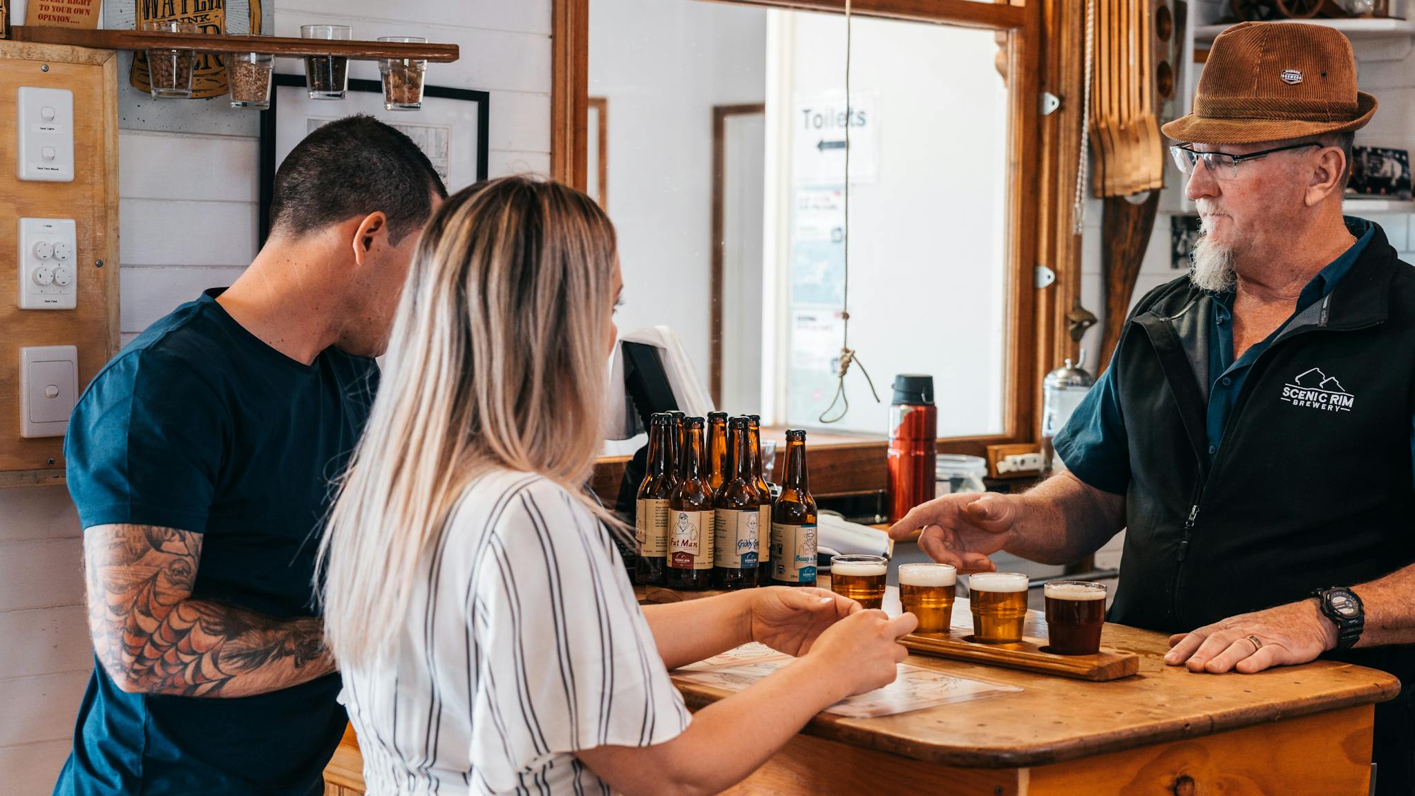Young couple beer tasting at Scenic Rim Brewery