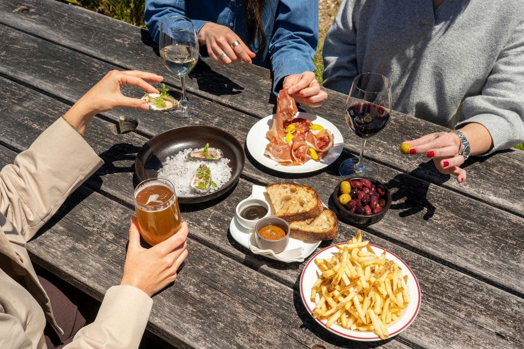 snacks and drinks shared on outdoor table