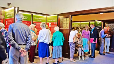 People viewing exhibition at inside the Church