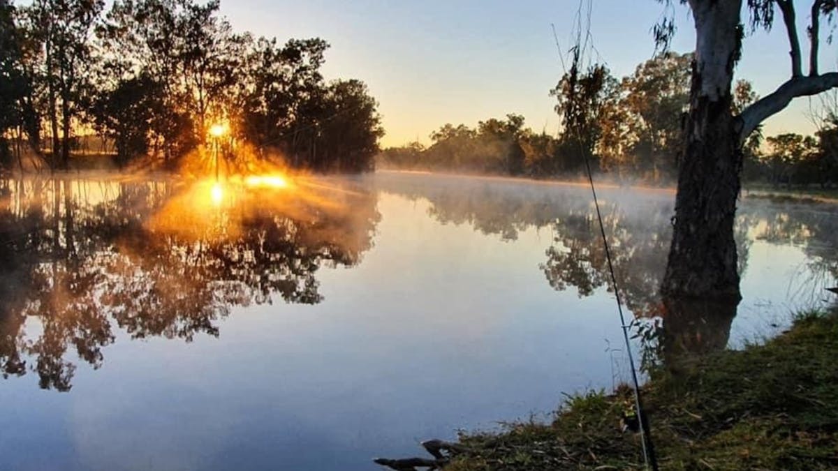 Sunset over creek with morning fog Sunset over creek with morning fog