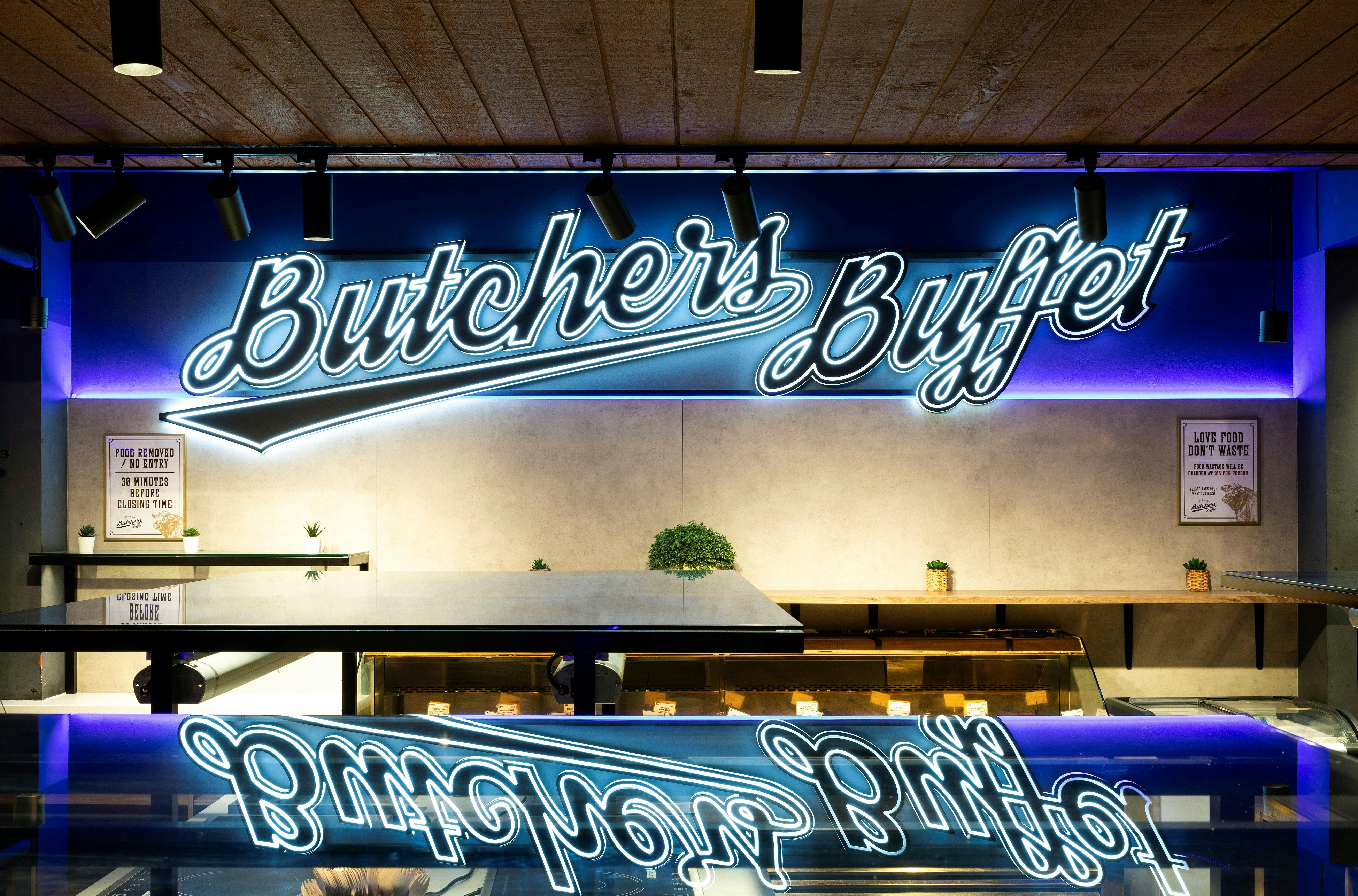 Illuminated Butchers Buffet signage inside the Blacktown restaurant
