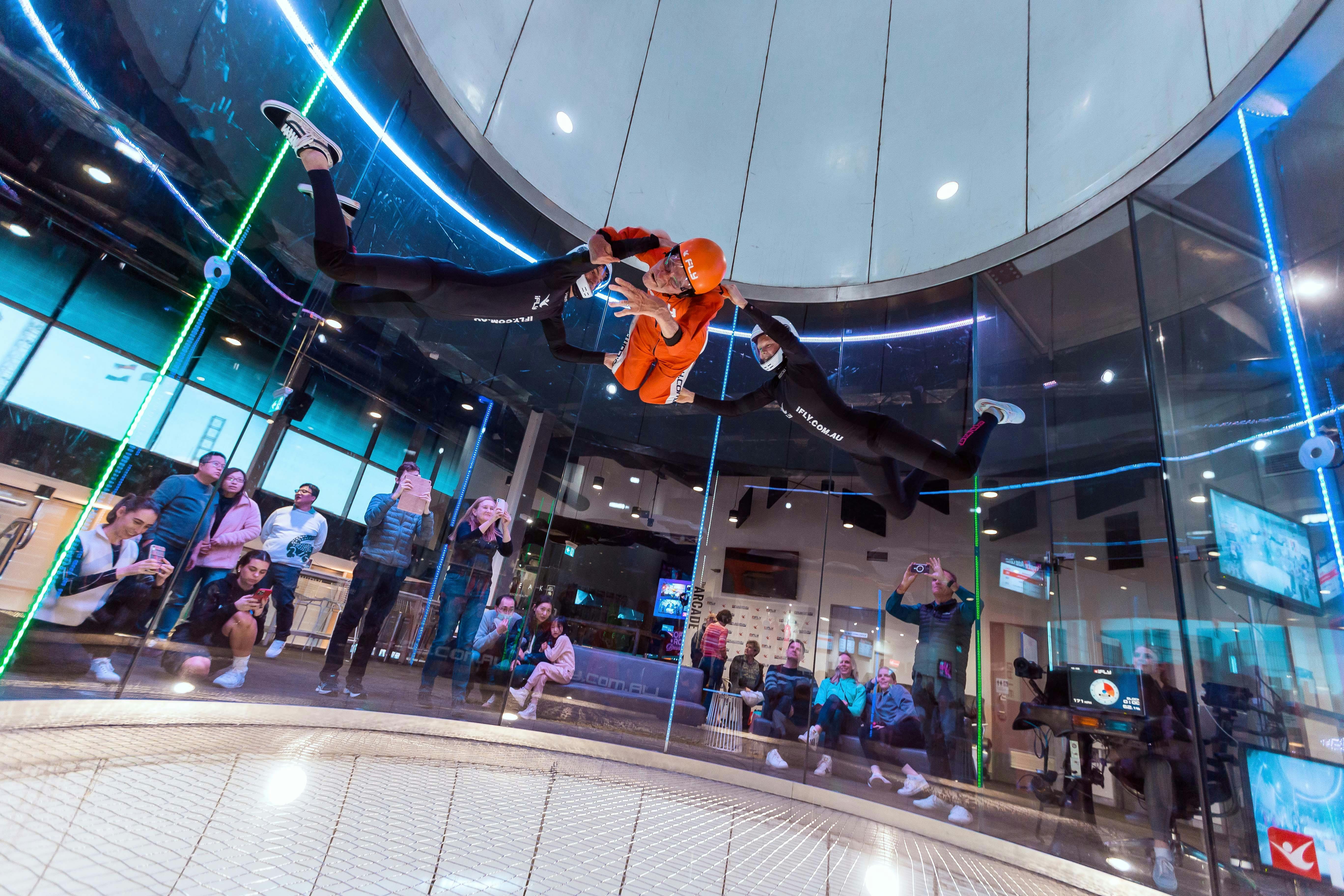All abilities flyer with two instructors lifts high into flight.