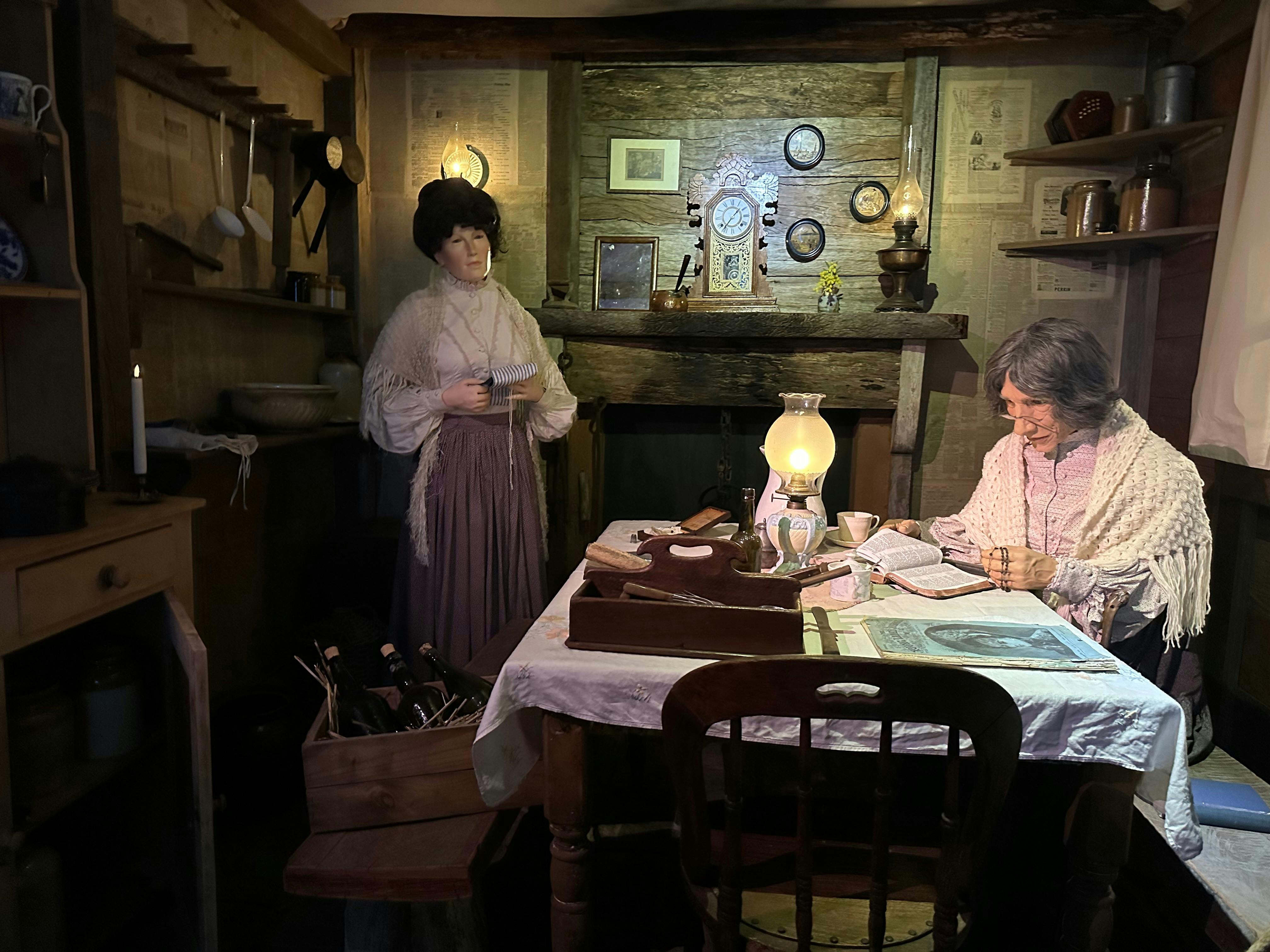 Lifelike figure of Ellen Kelly in the replica of her Homestead