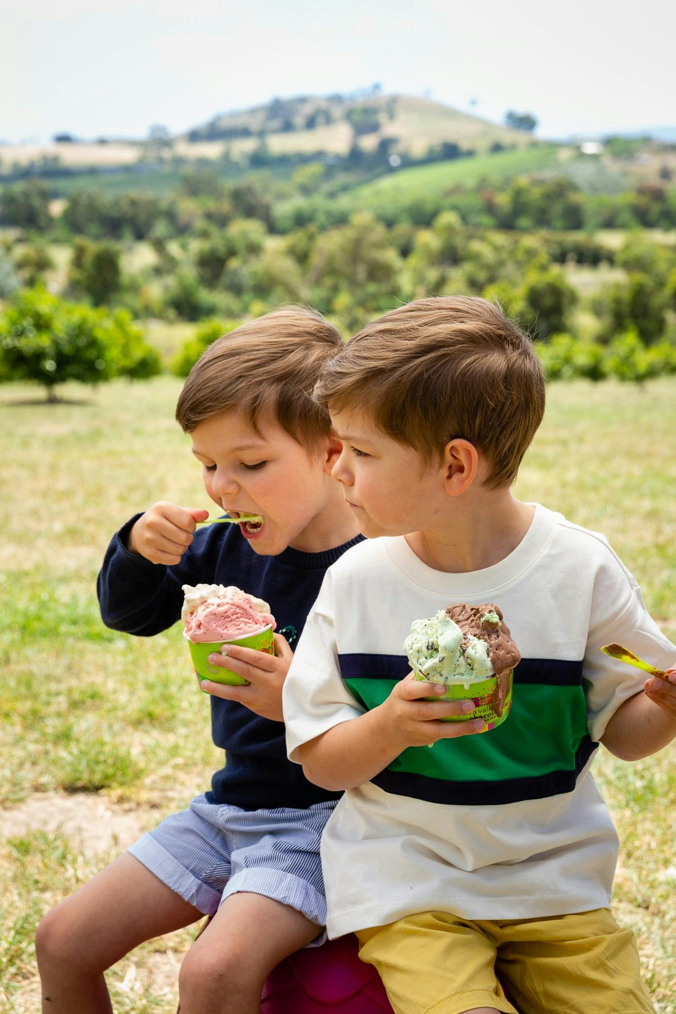Twins enjoying ice cream