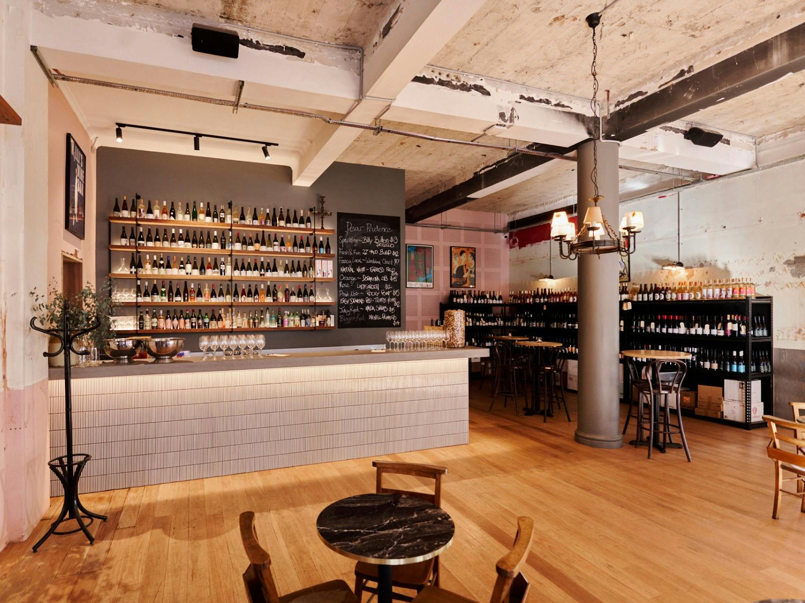 Bar with shelf full of different wines