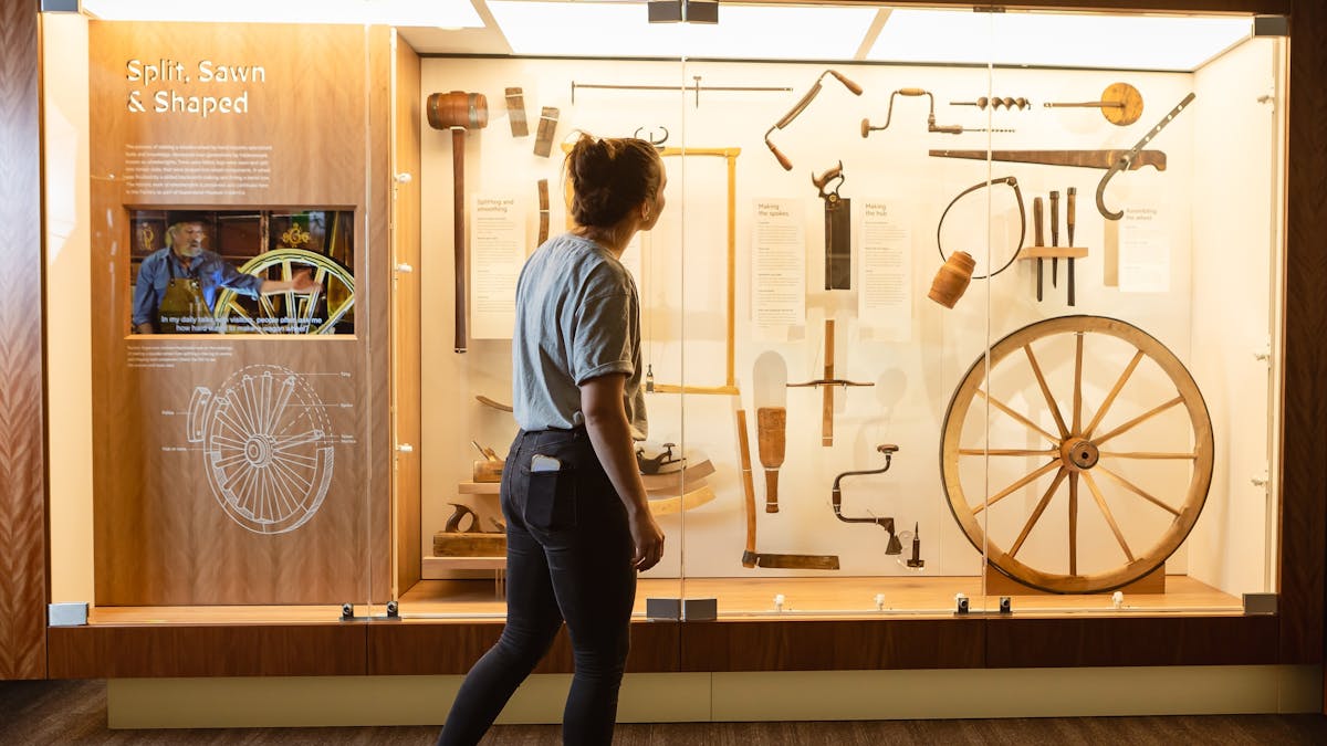 Woman looking at display of hand tools