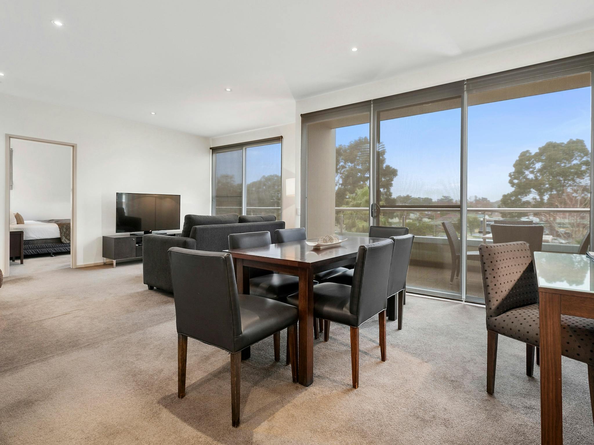 The Gateway's Two Bedroom Apartments include dining, lounge and outdoor balcony