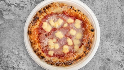 San Marzano Tomatoes, Fior de latte, Double smoke ham, Cinnamon Pineapple and finish with Oregano