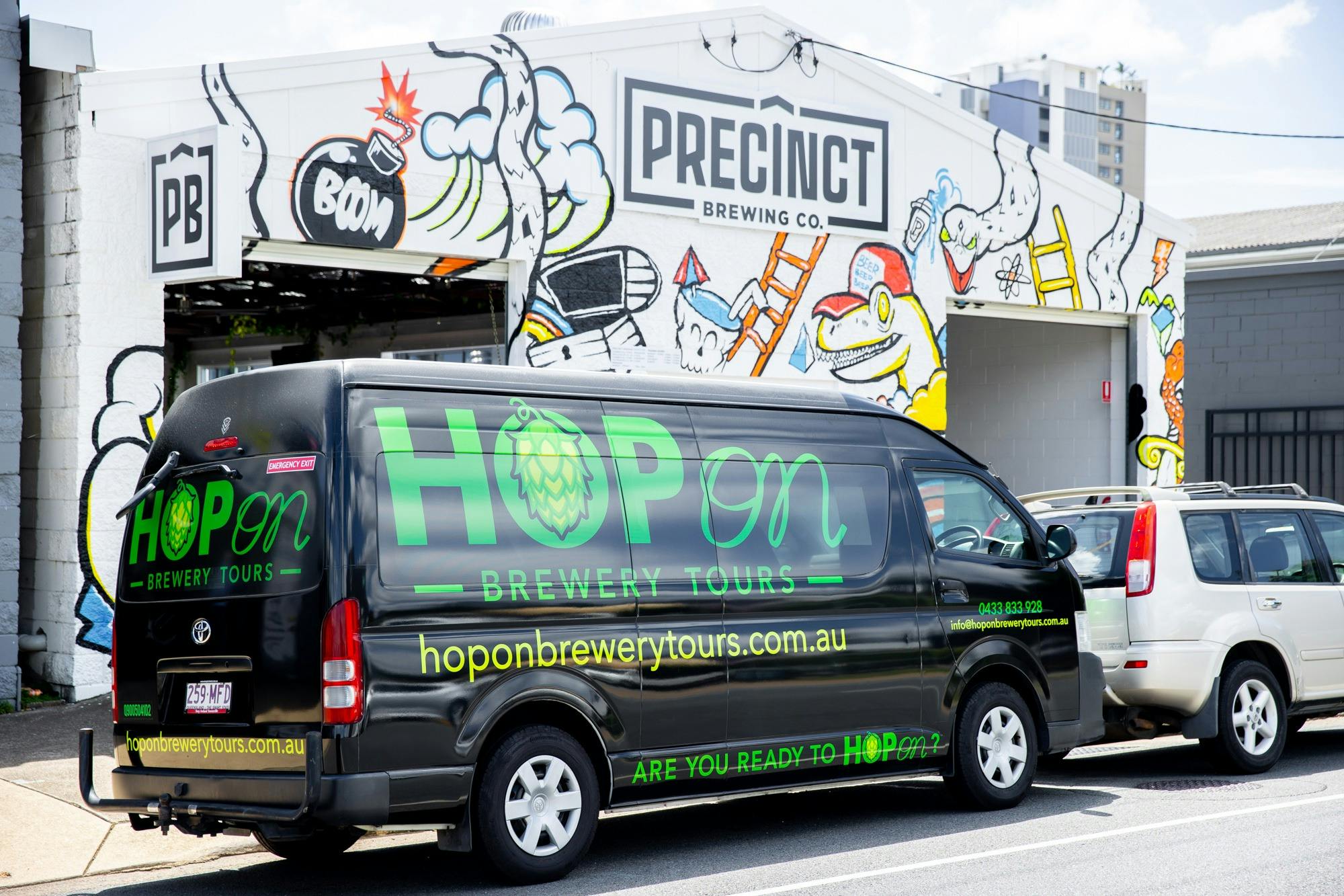 Hop On Brewery Tours in front of Precinct