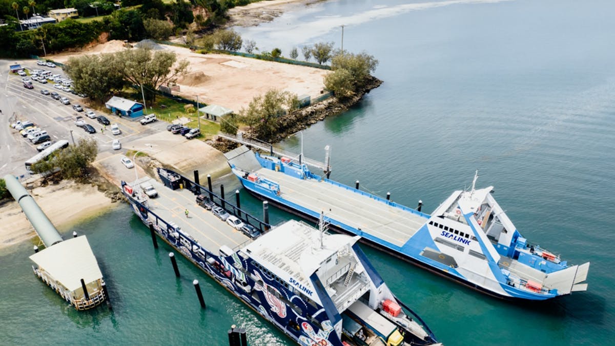 Two large vehicle ferries moored at port in Dunwich on North Stradbroke Island