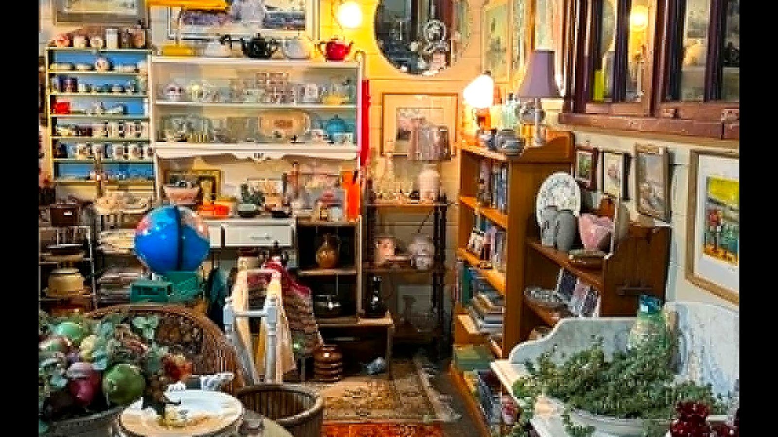 Retro kitchenalia, glassware, books and curiosities in a cosy corner