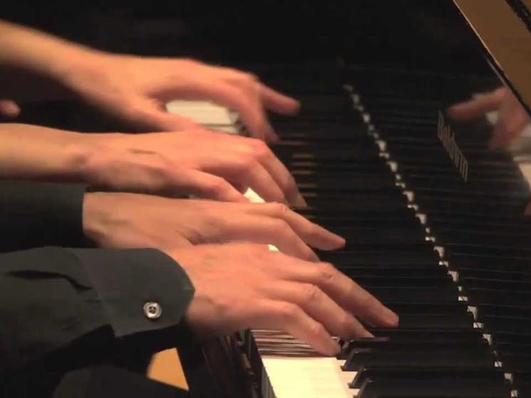 Quattro Mani for Two Pianos