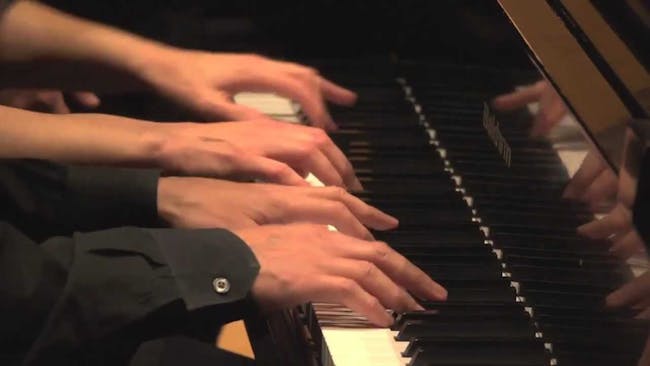 Quattro Mani for Two Pianos